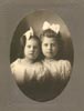 Edna and Sally Clay. Edna (b.1902) is age 4. Sally (b.1899) is age 7. Picture taken September 1906 i