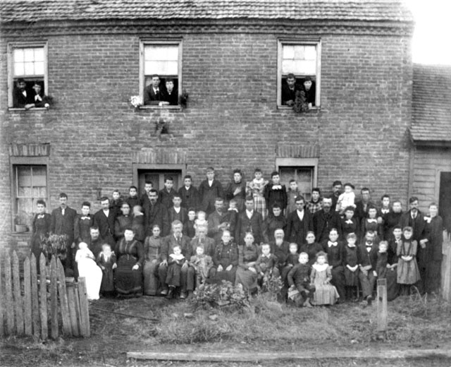 A reunion at the home of James Crabtree Dew sometime before 1875. Located in Monroe, Perry County, O