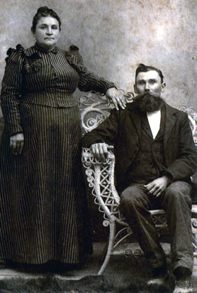 Sarah Henrietta (Sallie) Hocott Warren (9 Mar 1855 - 3 Nov 1903). The gentleman is either her father